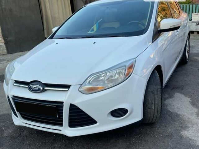 Белый Форд Фокус, объемом двигателя 2 л и пробегом 210 тыс. км за 7400 $, фото 1 на Automoto.ua