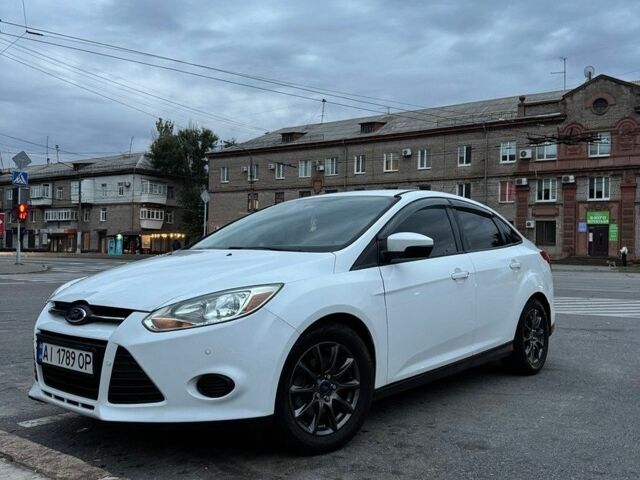 Білий Форд Фокус, об'ємом двигуна 2 л та пробігом 174 тис. км за 7500 $, фото 1 на Automoto.ua
