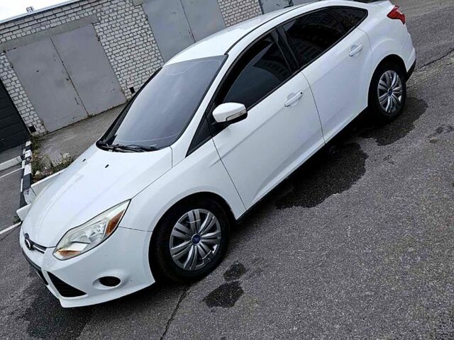 Белый Форд Фокус, объемом двигателя 2 л и пробегом 173 тыс. км за 6100 $, фото 1 на Automoto.ua