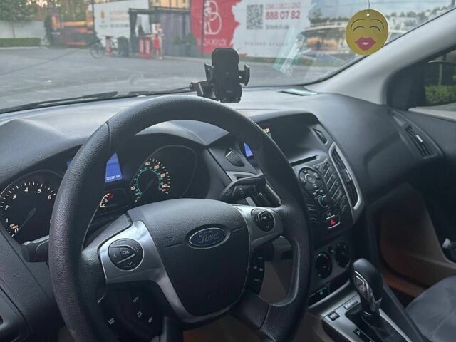 Білий Форд Фокус, об'ємом двигуна 2 л та пробігом 224 тис. км за 7100 $, фото 1 на Automoto.ua