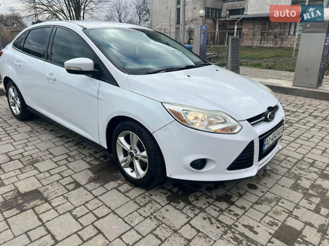 Білий Форд Фокус, об'ємом двигуна 2 л та пробігом 210 тис. км за 6500 $, фото 1 на Automoto.ua