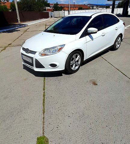 Белый Форд Фокус, объемом двигателя 2 л и пробегом 230 тыс. км за 8500 $, фото 1 на Automoto.ua