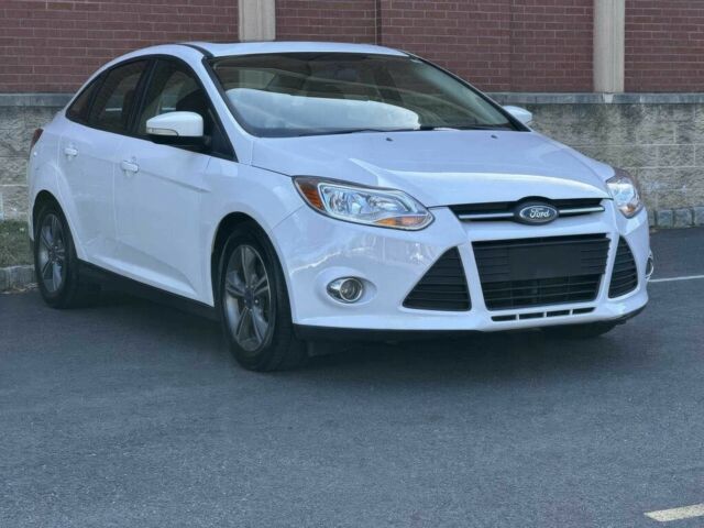 Форд Фокус 2014 в Ивано-Франковске на Automoto.ua Белый Форд Фокус, объемом двигателя 2 л и пробегом 87 тыс. км за 6000 $, фото 1 на Automoto.ua