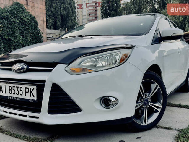 Білий Форд Фокус, об'ємом двигуна 2 л та пробігом 223 тис. км за 6999 $, фото 1 на Automoto.ua