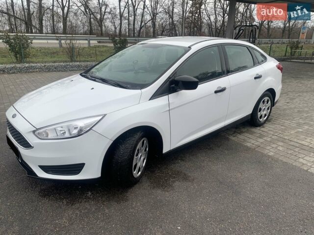 Белый Форд Фокус, объемом двигателя 2 л и пробегом 320 тыс. км за 7000 $, фото 1 на Automoto.ua