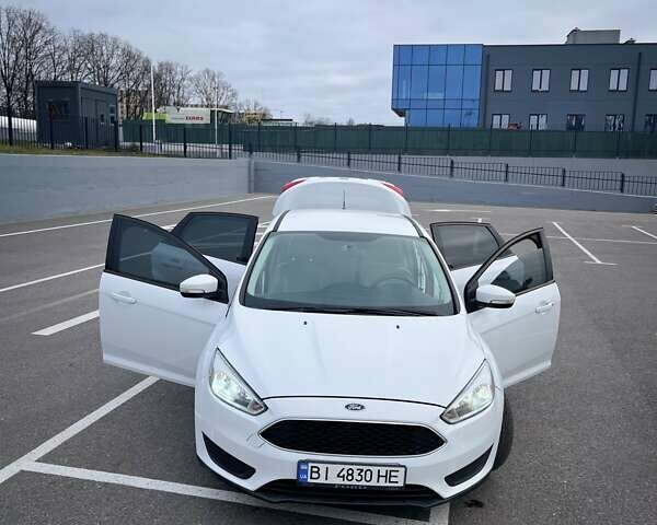 Белый Форд Фокус, объемом двигателя 2 л и пробегом 205 тыс. км за 8300 $, фото 1 на Automoto.ua