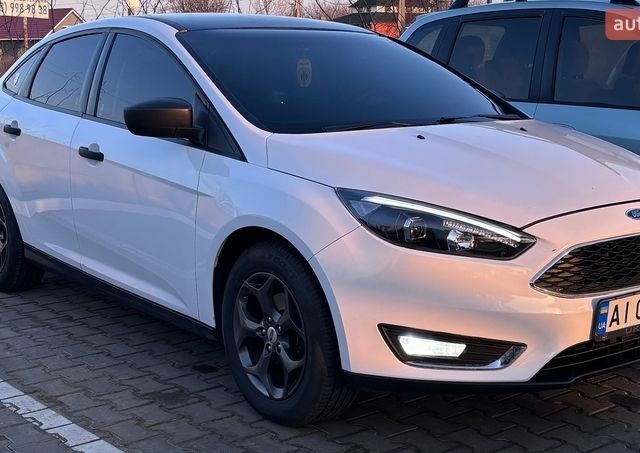 Білий Форд Фокус, об'ємом двигуна 2 л та пробігом 171 тис. км за 8000 $, фото 1 на Automoto.ua