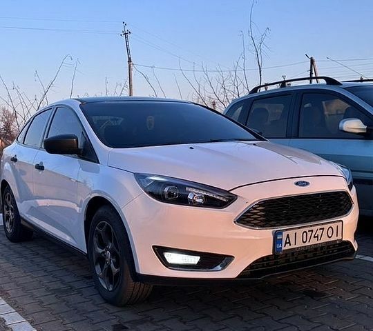 Белый Форд Фокус, объемом двигателя 2 л и пробегом 174 тыс. км за 7500 $, фото 1 на Automoto.ua