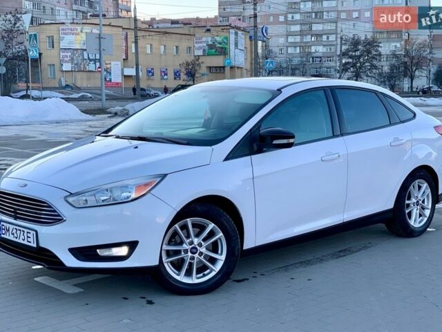 Белый Форд Фокус, объемом двигателя 2 л и пробегом 144 тыс. км за 7599 $, фото 1 на Automoto.ua
