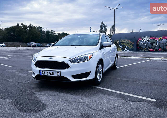 Білий Форд Фокус, об'ємом двигуна 2 л та пробігом 105 тис. км за 9800 $, фото 1 на Automoto.ua