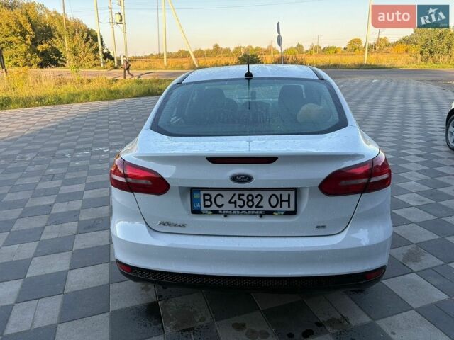 Білий Форд Фокус, об'ємом двигуна 2 л та пробігом 173 тис. км за 6500 $, фото 1 на Automoto.ua