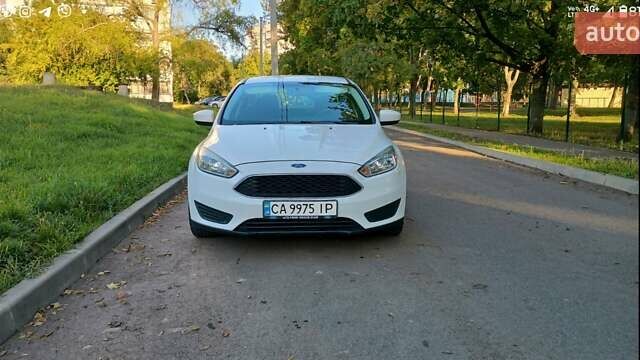 Білий Форд Фокус, об'ємом двигуна 2 л та пробігом 147 тис. км за 8900 $, фото 1 на Automoto.ua