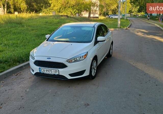 Білий Форд Фокус, об'ємом двигуна 2 л та пробігом 147 тис. км за 8600 $, фото 1 на Automoto.ua