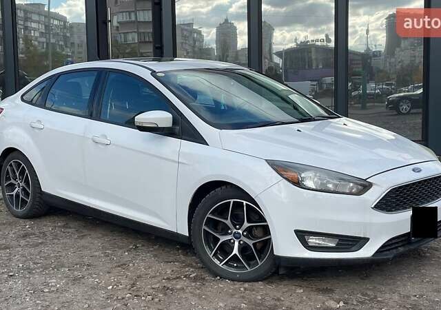 Белый Форд Фокус, объемом двигателя 2 л и пробегом 240 тыс. км за 8290 $, фото 1 на Automoto.ua