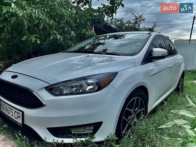 Білий Форд Фокус, об'ємом двигуна 2 л та пробігом 148 тис. км за 8888 $, фото 1 на Automoto.ua