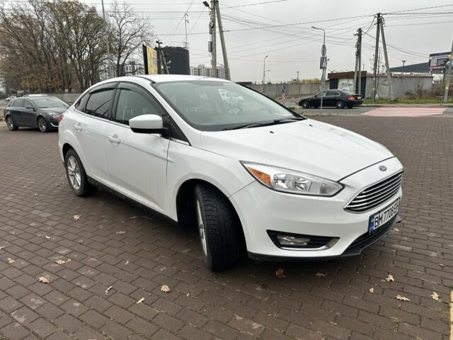 Белый Форд Фокус, объемом двигателя 2 л и пробегом 116 тыс. км за 7850 $, фото 1 на Automoto.ua