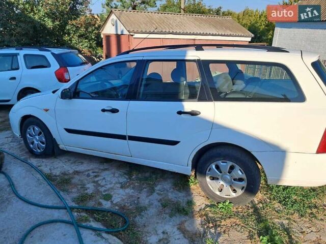 Белый Форд Фокус, объемом двигателя 1.75 л и пробегом 500 тыс. км за 3000 $, фото 1 на Automoto.ua