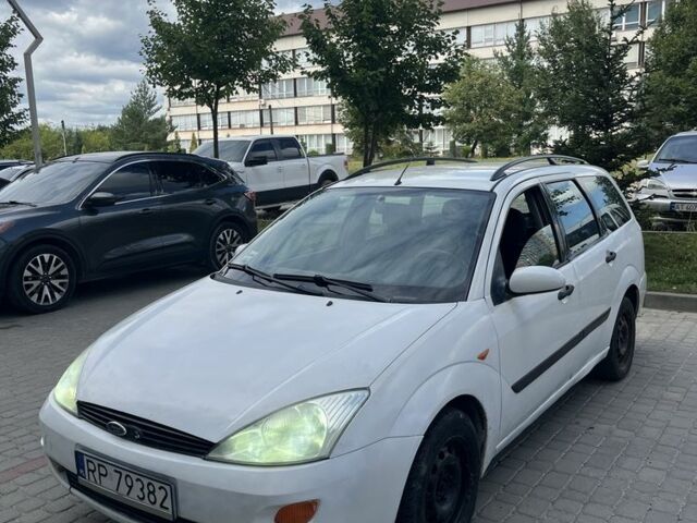 Білий Форд Фокус, об'ємом двигуна 1.8 л та пробігом 300 тис. км за 1002 $, фото 1 на Automoto.ua