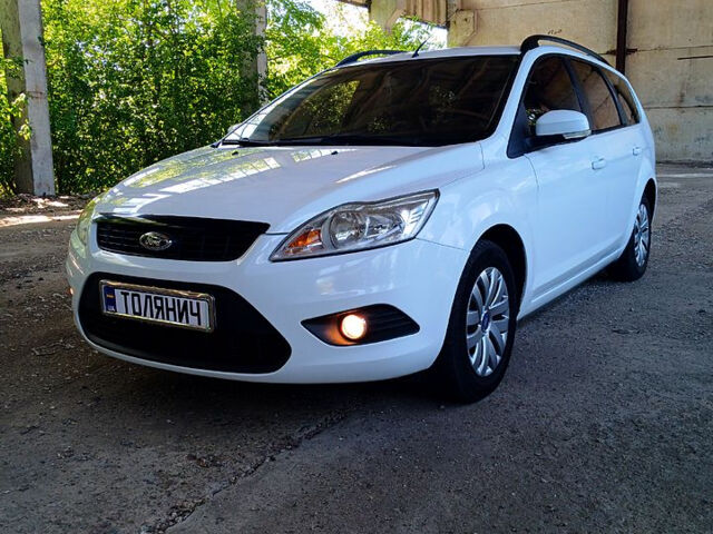 Белый Форд Фокус, объемом двигателя 1.8 л и пробегом 201 тыс. км за 4850 $, фото 1 на Automoto.ua