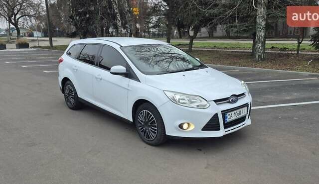 Білий Форд Фокус, об'ємом двигуна 1.6 л та пробігом 310 тис. км за 6500 $, фото 1 на Automoto.ua