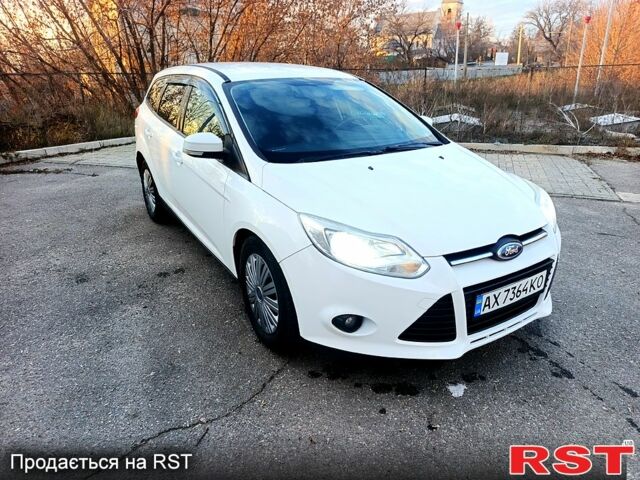 Белый Форд Фокус, объемом двигателя 1.6 л и пробегом 230 тыс. км за 7500 $, фото 1 на Automoto.ua