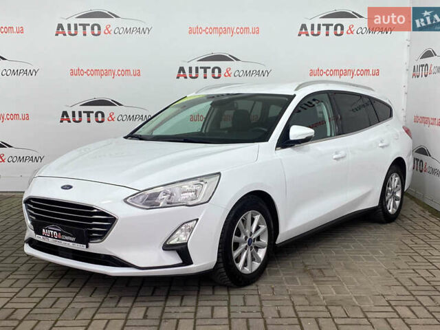 Білий Форд Фокус, об'ємом двигуна 2 л та пробігом 180 тис. км за 14250 $, фото 1 на Automoto.ua