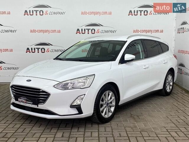 Белый Форд Фокус, объемом двигателя 2 л и пробегом 180 тыс. км за 14250 $, фото 1 на Automoto.ua