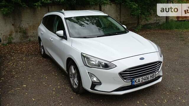 Белый Форд Фокус, объемом двигателя 2 л и пробегом 194 тыс. км за 14800 $, фото 1 на Automoto.ua