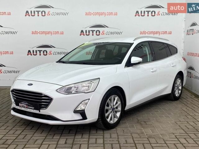 Білий Форд Фокус, об'ємом двигуна 2 л та пробігом 180 тис. км за 14250 $, фото 1 на Automoto.ua