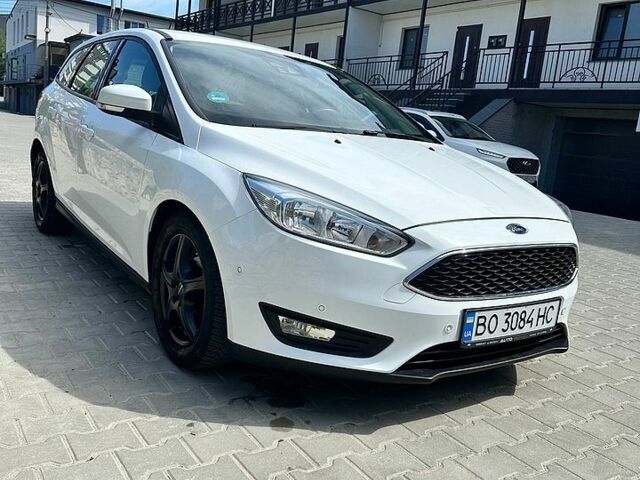 Белый Форд Фокус, объемом двигателя 2 л и пробегом 225 тыс. км за 16700 $, фото 1 на Automoto.ua