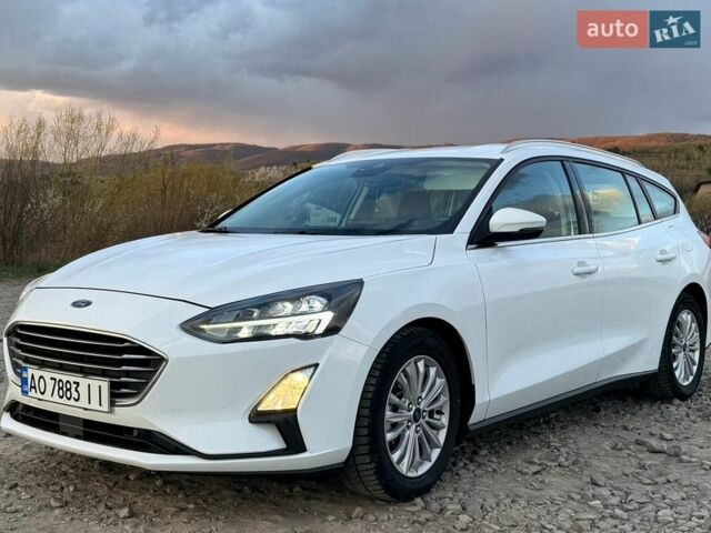 Белый Форд Фокус, объемом двигателя 2 л и пробегом 245 тыс. км за 13700 $, фото 1 на Automoto.ua