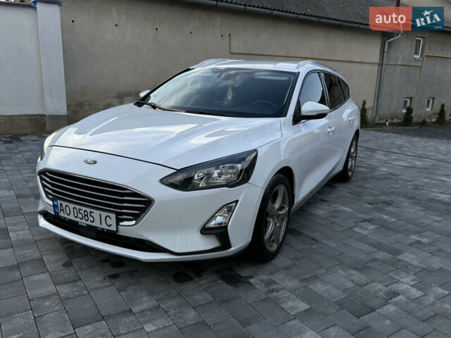 Білий Форд Фокус, об'ємом двигуна 1.5 л та пробігом 205 тис. км за 12400 $, фото 1 на Automoto.ua