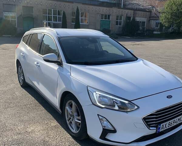 Белый Форд Фокус, объемом двигателя 1.5 л и пробегом 218 тыс. км за 13000 $, фото 1 на Automoto.ua