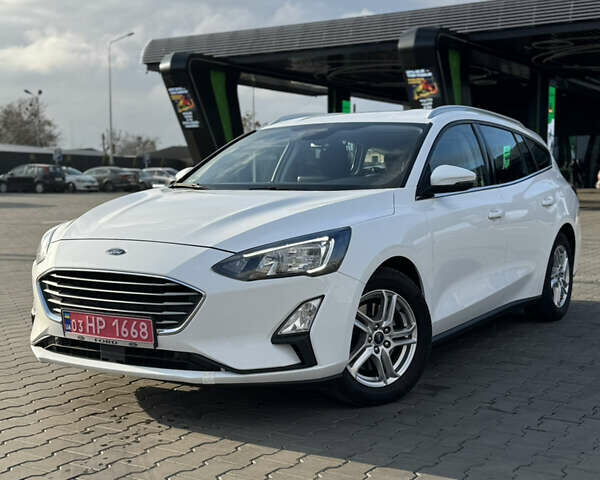 Белый Форд Фокус, объемом двигателя 1.5 л и пробегом 180 тыс. км за 13499 $, фото 1 на Automoto.ua
