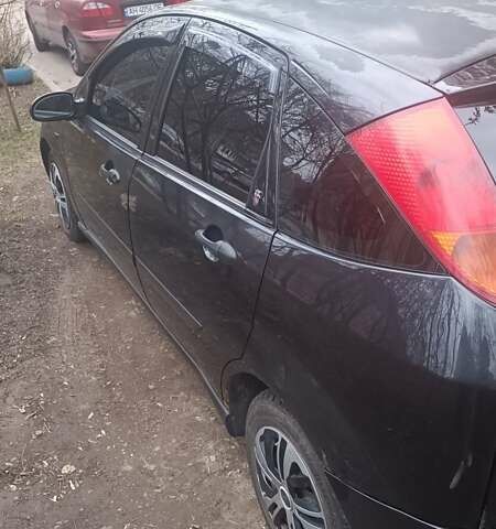 Черный Форд Фокус, объемом двигателя 1.6 л и пробегом 345 тыс. км за 2500 $, фото 1 на Automoto.ua