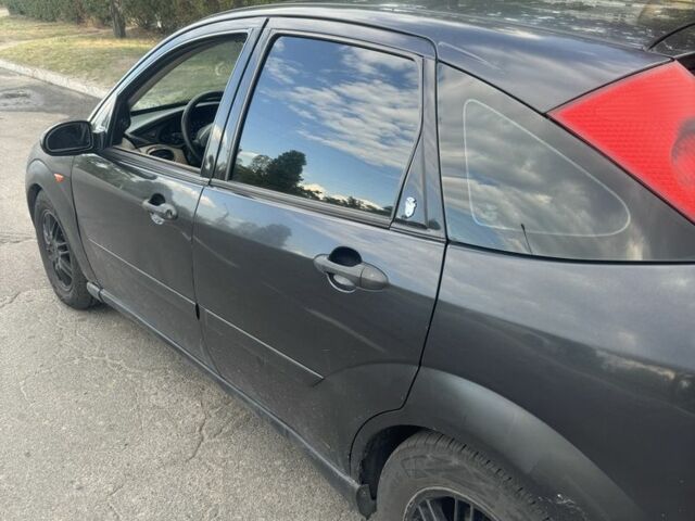 Черный Форд Фокус, объемом двигателя 1.8 л и пробегом 344 тыс. км за 3600 $, фото 1 на Automoto.ua