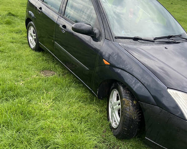 Черный Форд Фокус, объемом двигателя 1.8 л и пробегом 280 тыс. км за 3300 $, фото 1 на Automoto.ua