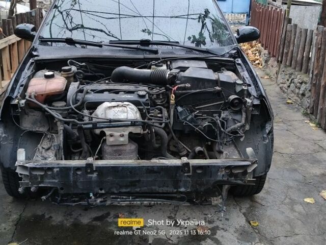Черный Форд Фокус, объемом двигателя 2 л и пробегом 250 тыс. км за 1300 $, фото 1 на Automoto.ua