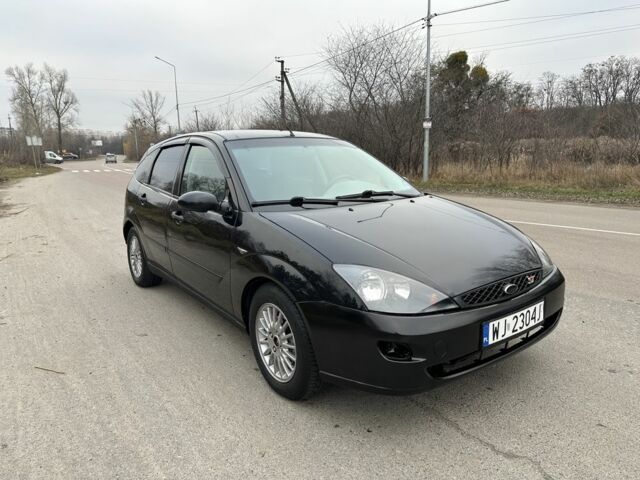 Черный Форд Фокус, объемом двигателя 1.8 л и пробегом 224 тыс. км за 1450 $, фото 1 на Automoto.ua