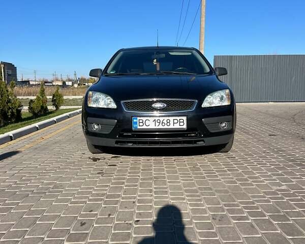 Черный Форд Фокус, объемом двигателя 1.6 л и пробегом 290 тыс. км за 5000 $, фото 1 на Automoto.ua