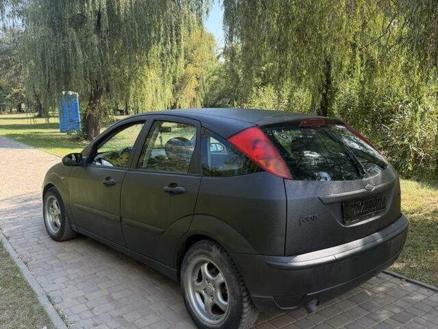 Черный Форд Фокус, объемом двигателя 1.8 л и пробегом 282 тыс. км за 1550 $, фото 1 на Automoto.ua