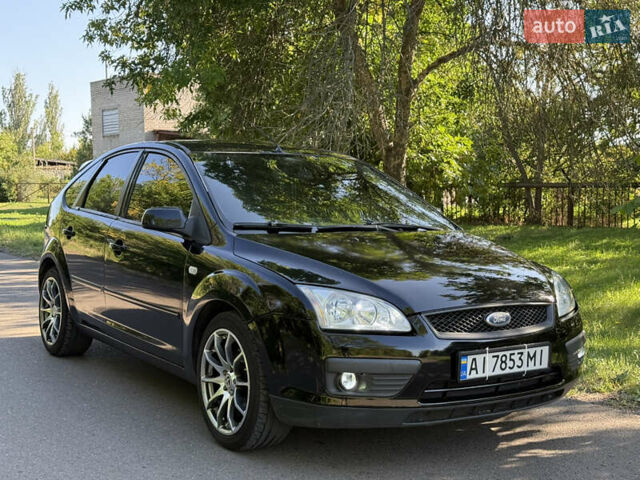 Черный Форд Фокус, объемом двигателя 1.6 л и пробегом 250 тыс. км за 4750 $, фото 1 на Automoto.ua