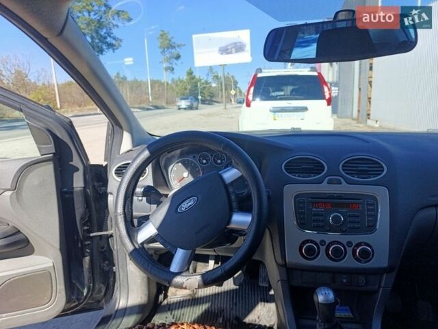 Черный Форд Фокус, объемом двигателя 1.6 л и пробегом 165 тыс. км за 5100 $, фото 1 на Automoto.ua