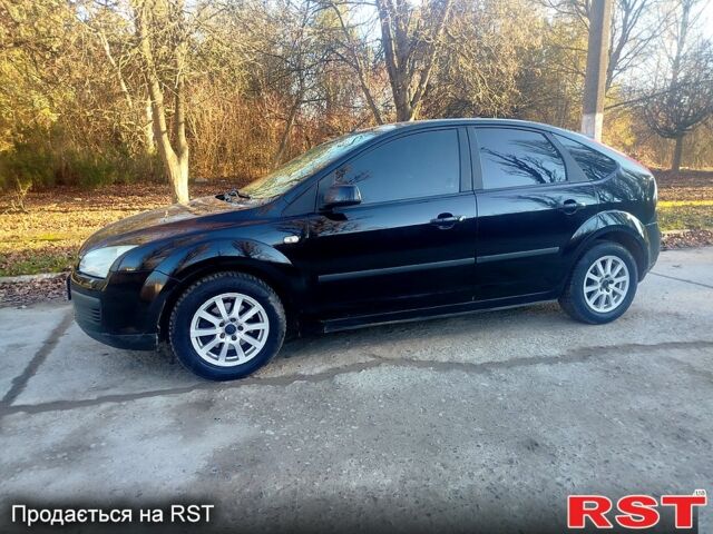 Черный Форд Фокус, объемом двигателя 1.8 л и пробегом 260 тыс. км за 3900 $, фото 1 на Automoto.ua