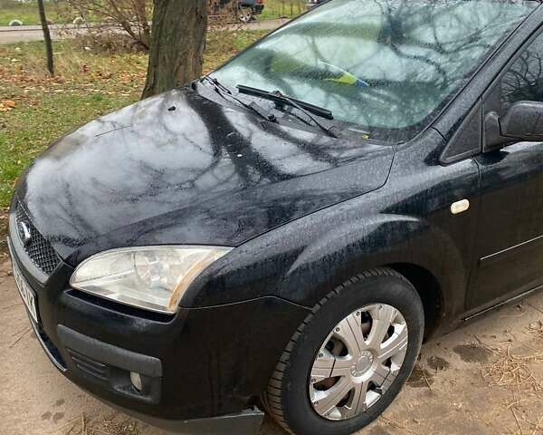 Черный Форд Фокус, объемом двигателя 1.6 л и пробегом 257 тыс. км за 2499 $, фото 1 на Automoto.ua