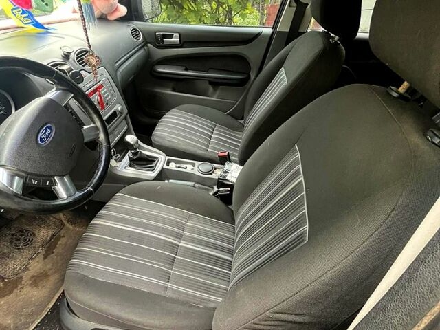 Черный Форд Фокус, объемом двигателя 1.6 л и пробегом 213 тыс. км за 5750 $, фото 1 на Automoto.ua