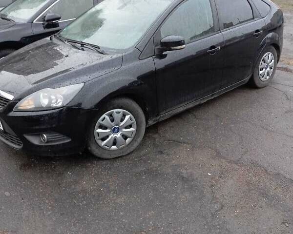 Черный Форд Фокус, объемом двигателя 1.6 л и пробегом 187 тыс. км за 4900 $, фото 1 на Automoto.ua