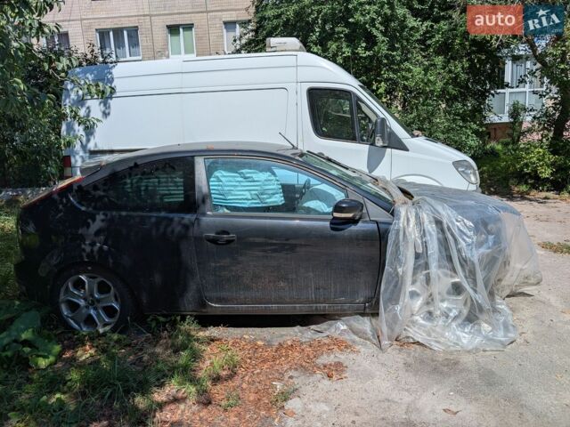 Черный Форд Фокус, объемом двигателя 2 л и пробегом 265 тыс. км за 1750 $, фото 1 на Automoto.ua