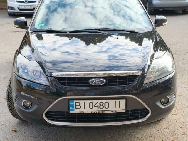 Черный Форд Фокус, объемом двигателя 1.6 л и пробегом 164 тыс. км за 7700 $, фото 1 на Automoto.ua