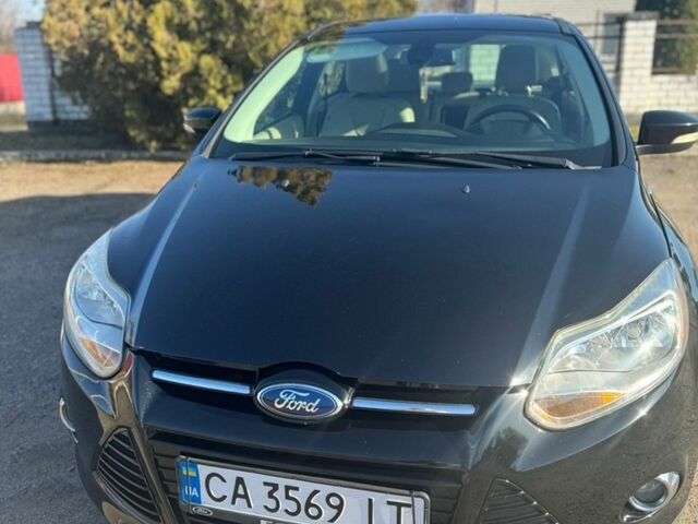 Чорний Форд Фокус, об'ємом двигуна 2 л та пробігом 130 тис. км за 9000 $, фото 1 на Automoto.ua